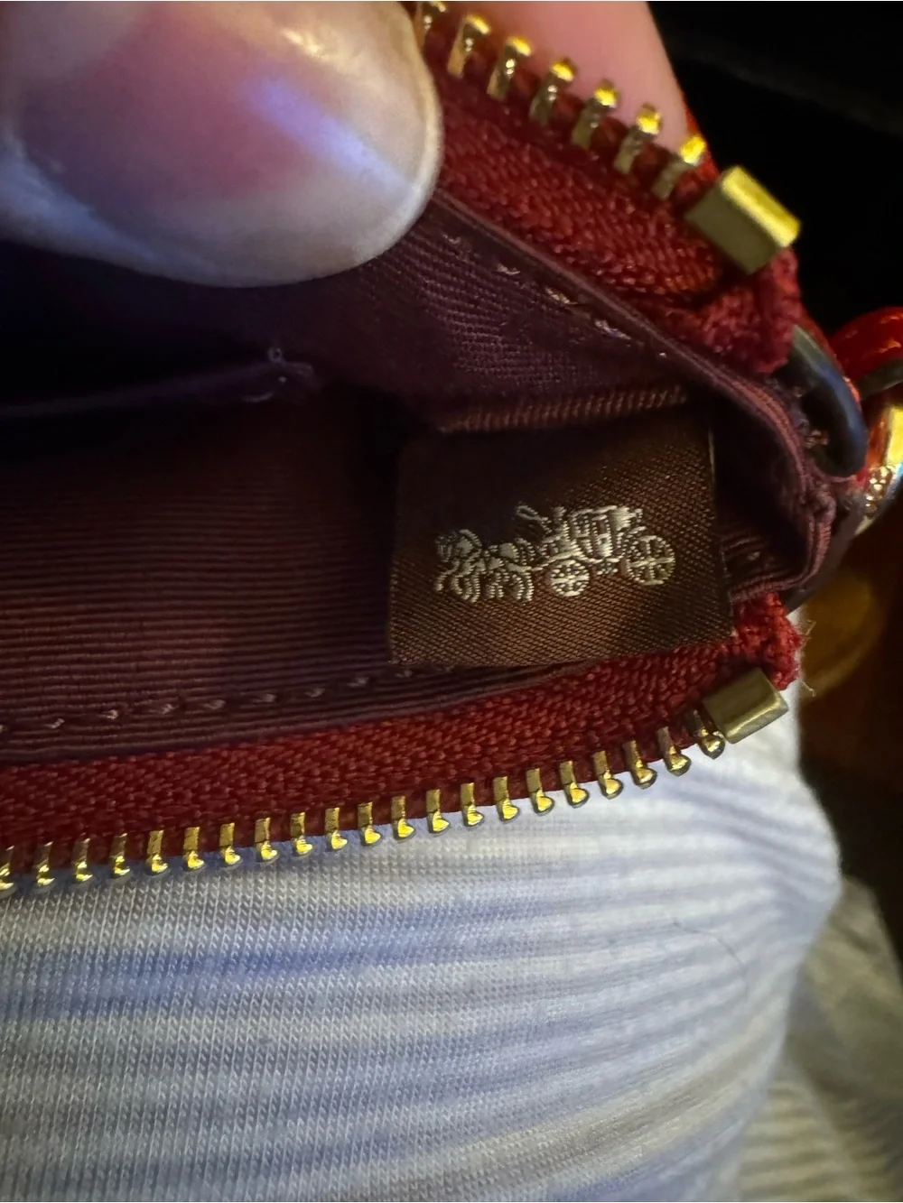 COACH Red Embossed Signature Wristlet with Gold Logo